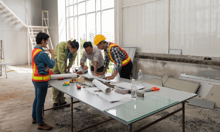 Small construction crew working together on project